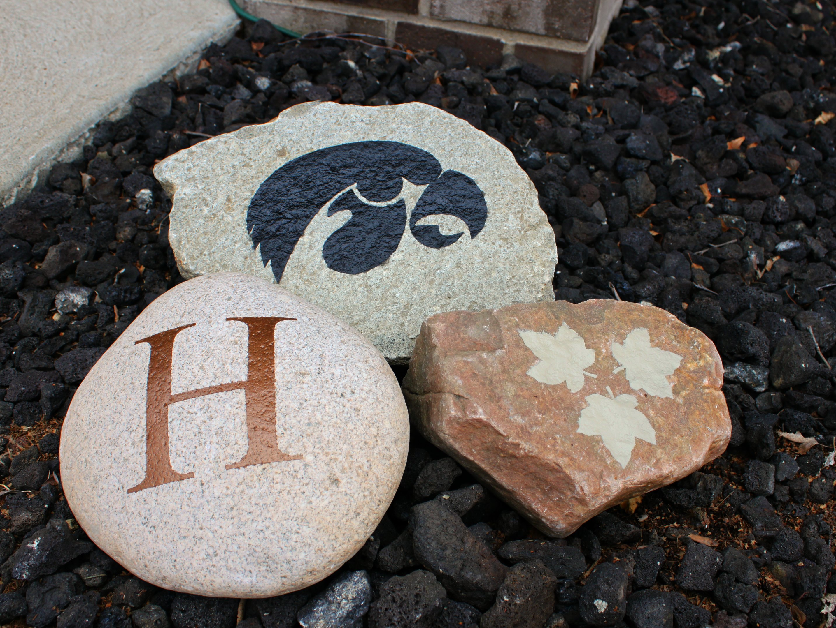 Stenciled Rocks - Monogram and Hawkeye
