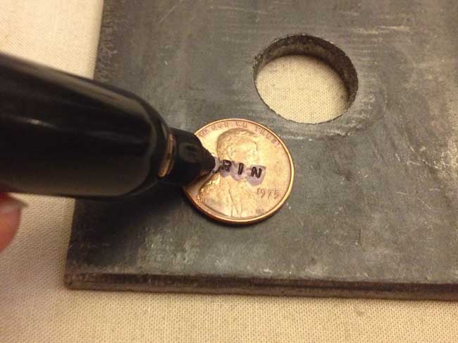 Hand stamped penny keychain - letter darkening